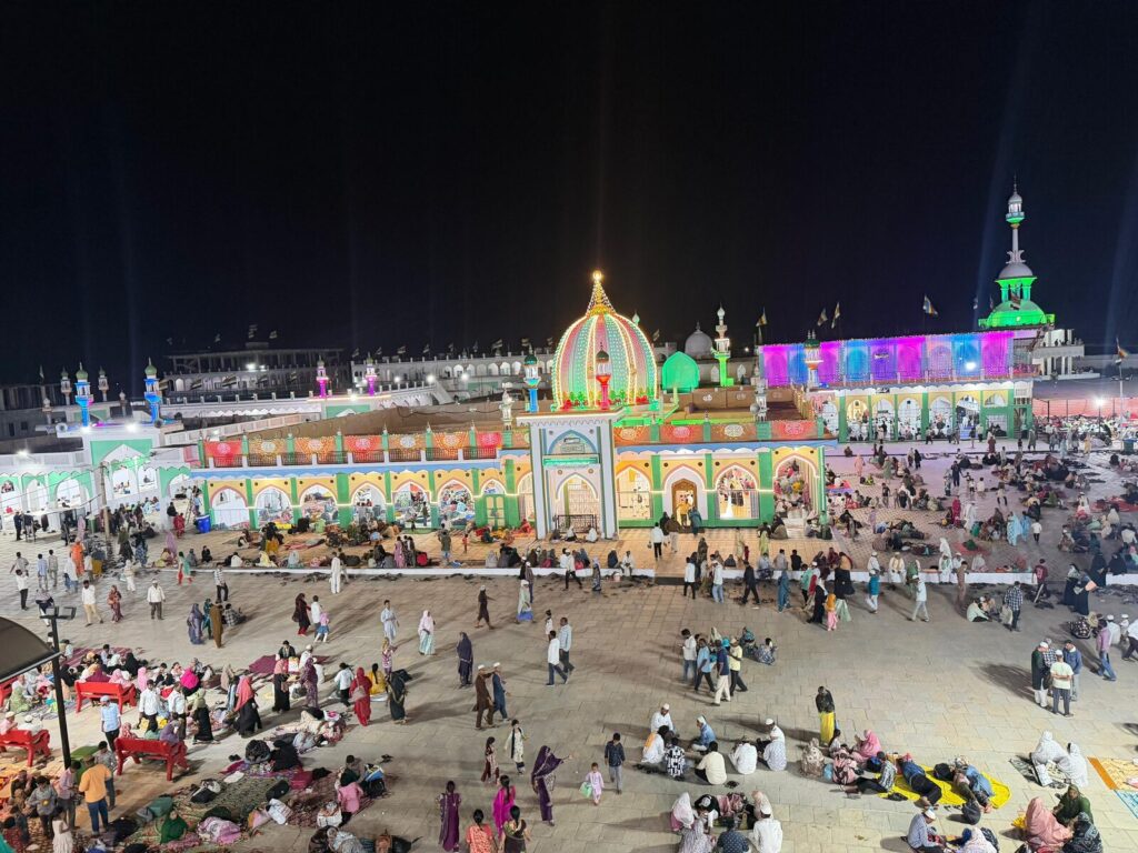 Night-time crowd at the shrine courtyard